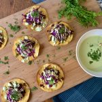 Tostadas on a Wooden Board with Toppings