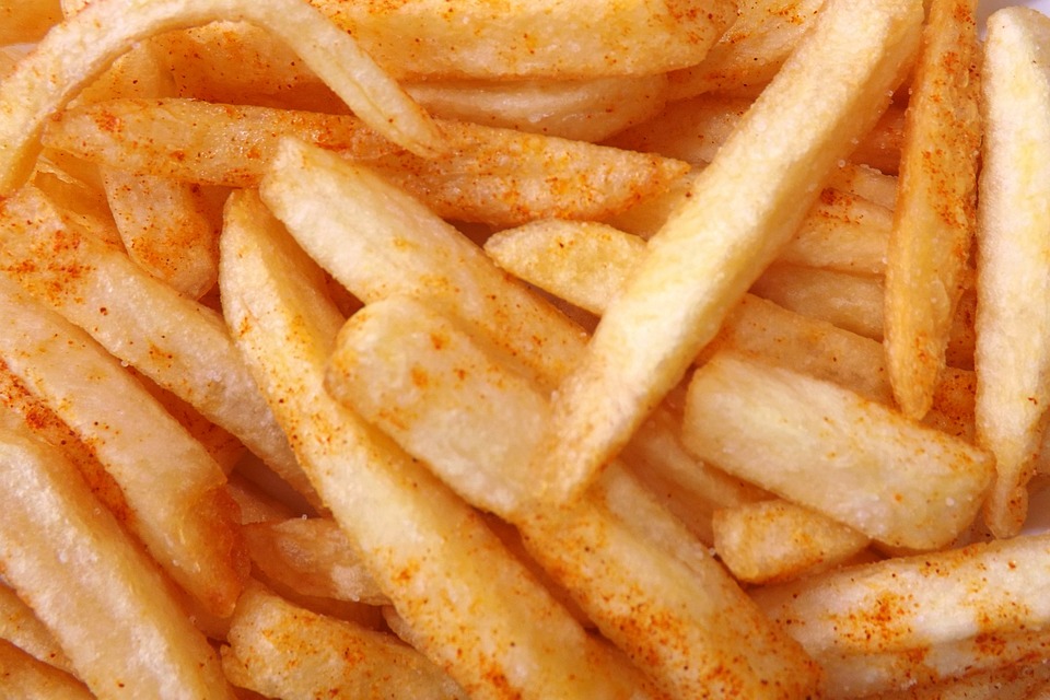 The French Fries at Five Guys are Gluten Free, but may have cross contamination.